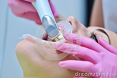 Woman dentist using dental intraoral scanner Stock Photo