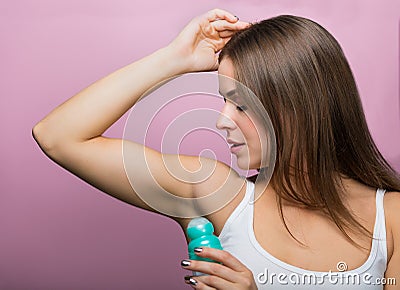 Woman with a deodorant Stock Photo