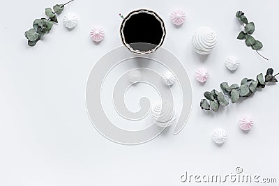 Woman desk with plant, coffee and marsh-mallow in spring desing on white background flat lay mock up Stock Photo