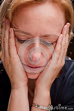 Woman in despair Stock Photo