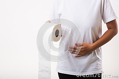 Woman diarrhea constipation holding tissue toilet paper roll on hand she crotch lower abdomen Stock Photo