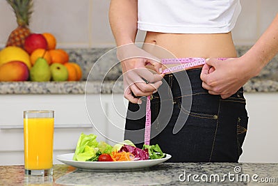 Woman on diet eating salad Stock Photo