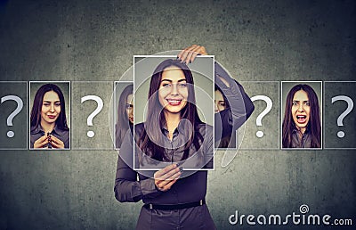 Woman with different portrait photos Stock Photo