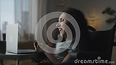 Woman with a disability talking via video call Stock Photo