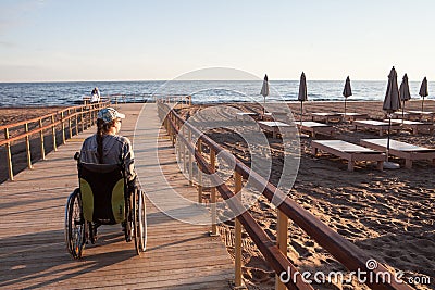 woman disabled on the terrace built specifically for disabled wheelchair Editorial Stock Photo