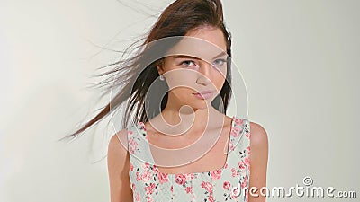 Woman disagree at white studio background. Stock Photo