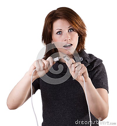 Woman disconnects cable Stock Photo