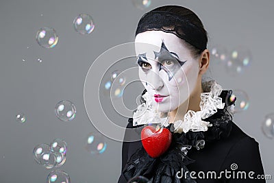 Woman in disguise harlequin Stock Photo