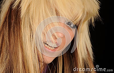 Woman with dishevelled hair Stock Photo