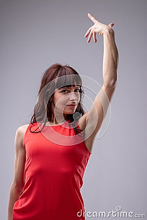 Woman diva gesturing with her hand Stock Photo