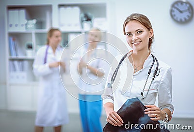 Woman doctor standingat hospital Stock Photo