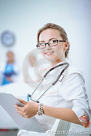 Woman doctor standingat hospital Stock Photo