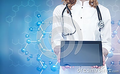 Woman doctor with a tablet, atomic grid background Stock Photo