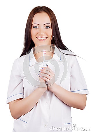 Woman doctor with toothbrush in hand Stock Photo