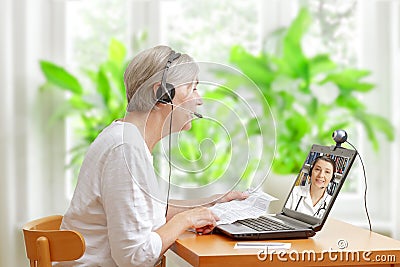 Woman doctor video call instruction leaflet Stock Photo