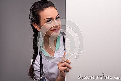 Woman doctor in white smock Stock Photo