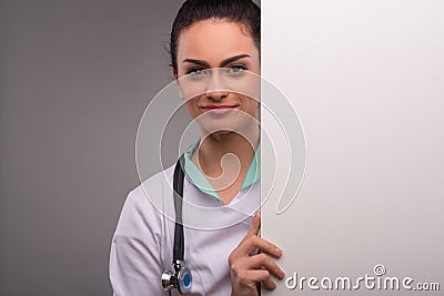 Woman doctor in white smock Stock Photo