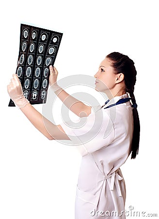 Woman doctor with x-rays of brain Stock Photo