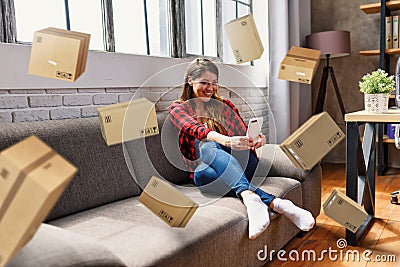Woman does shopping through e-commerce online shop. Concept of fast delivery Stock Photo