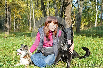 Woman with dogs Stock Photo
