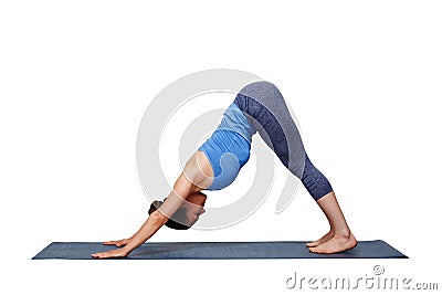 Woman doing Ashtanga Vinyasa yoga asana Adhomukha svanasana Stock Photo