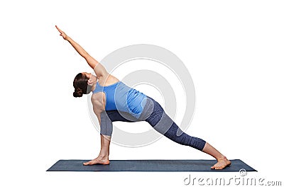 Woman doing Ashtanga Vinyasa yoga asana Parivrtta parsvakonasana Stock Photo