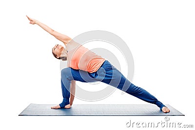 Woman doing Ashtanga Vinyasa Yoga asana Utthita parsvakonasana Stock Photo