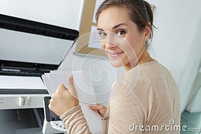 woman doing copies with thumb up Stock Photo