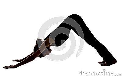 Woman doing Downward Facing dog pose in yoga Stock Photo