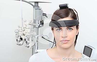 Woman doing eyesight measurement, balance test Stock Photo