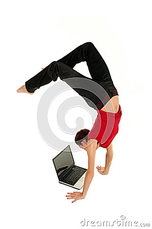 Woman doing handstand Stock Photo