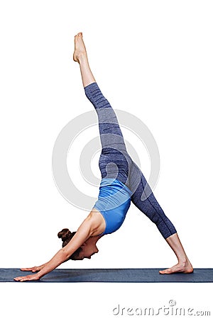 Woman doing Hatha yoga Eka pada adhomukha svanasana Stock Photo