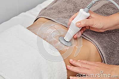 Woman doing lipo at the beautician. Spa concept Stock Photo