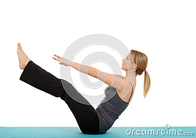 Woman doing Pilates teaser pose Stock Photo