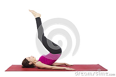 Woman doing reverse crunch during fitness Stock Photo