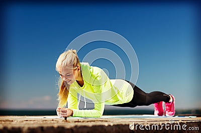 Woman doing sports outdoors Stock Photo