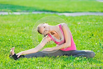 Woman doing stretching fitness exercise. Yoga postures Stock Photo