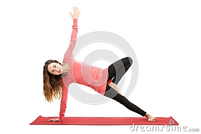 Woman doing tree pose variation Stock Photo