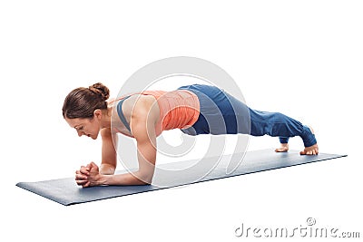 Woman doing Yoga asana Chaturanga dandasana plank pose Stock Photo