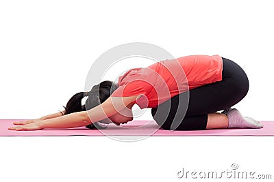 Woman doing yoga child pose Stock Photo
