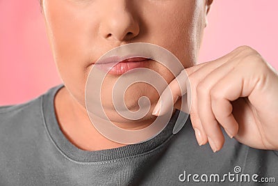Woman with double chin on pink, closeup Stock Photo