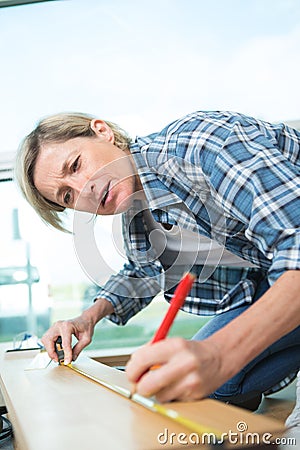 Woman drawing wood board Stock Photo