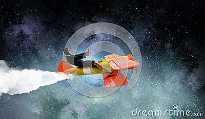 Woman in drawn airplane . Mixed media . Mixed media Stock Photo