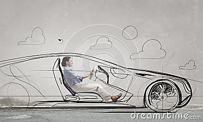 Woman in drawn car Stock Photo