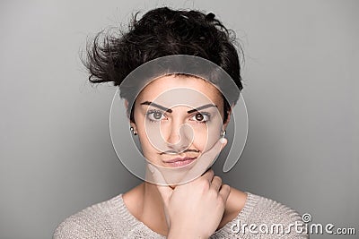 Woman with Drawn Mustaches Stock Photo