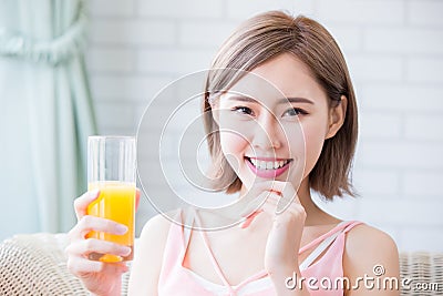 Woman drink juice Stock Photo
