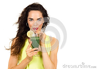 Woman drinking a green smoothie. Stock Photo
