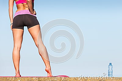 Woman drinking water after sport gym outdoor Stock Photo