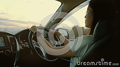 Woman drive a modern car on the road. Stock Photo