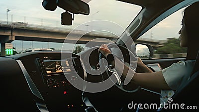 Woman drive a modern car on the road. Stock Photo